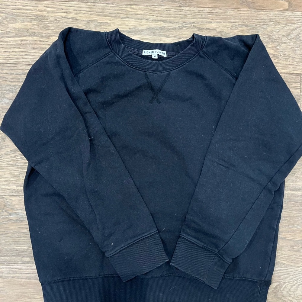 Richer poorer Black Crewneck Sweatshirt